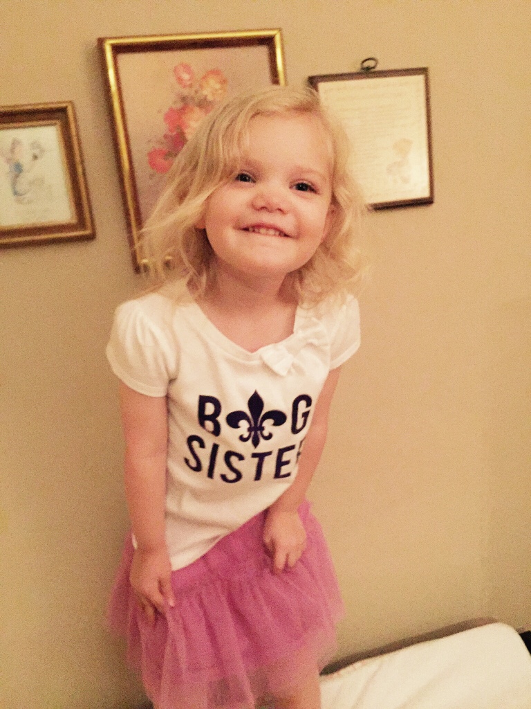 penelope the big sister in a tutu